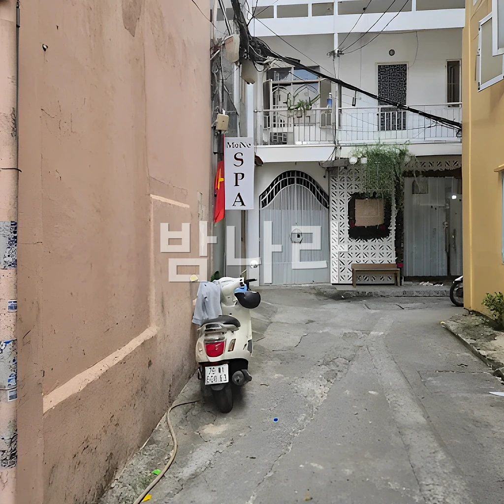 호치민 모네 스파 관리룸 베드와 샤워 시설